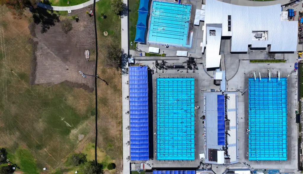 Pools at the William Woollett Jr. Aquatics Center next to...