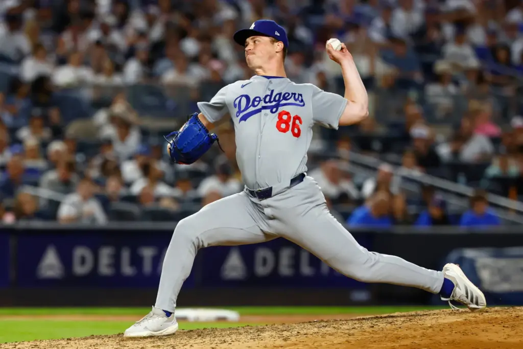 Dodgers pitcher Jack Dreyer throws against the New York Yankees...