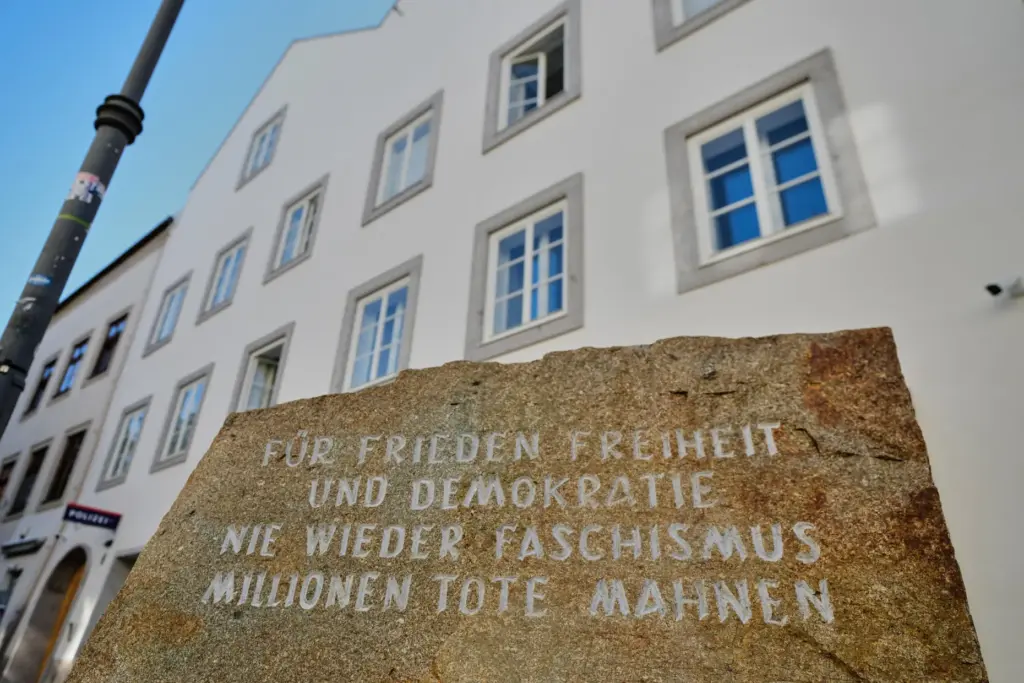 A new police station with a memorial stone reading “for...