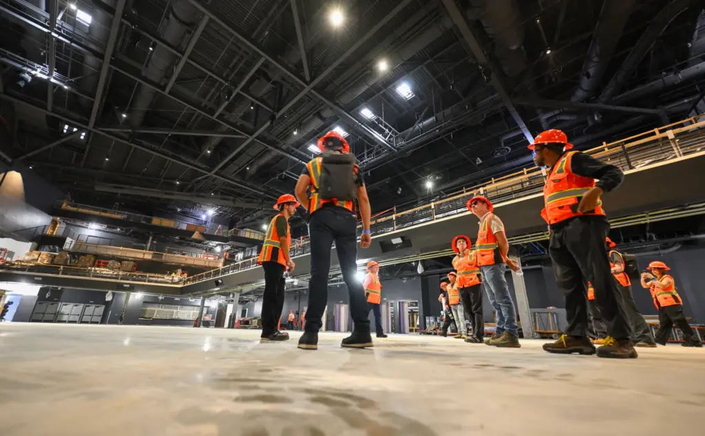 Visitors tour construction at the new concert hall at OC...
