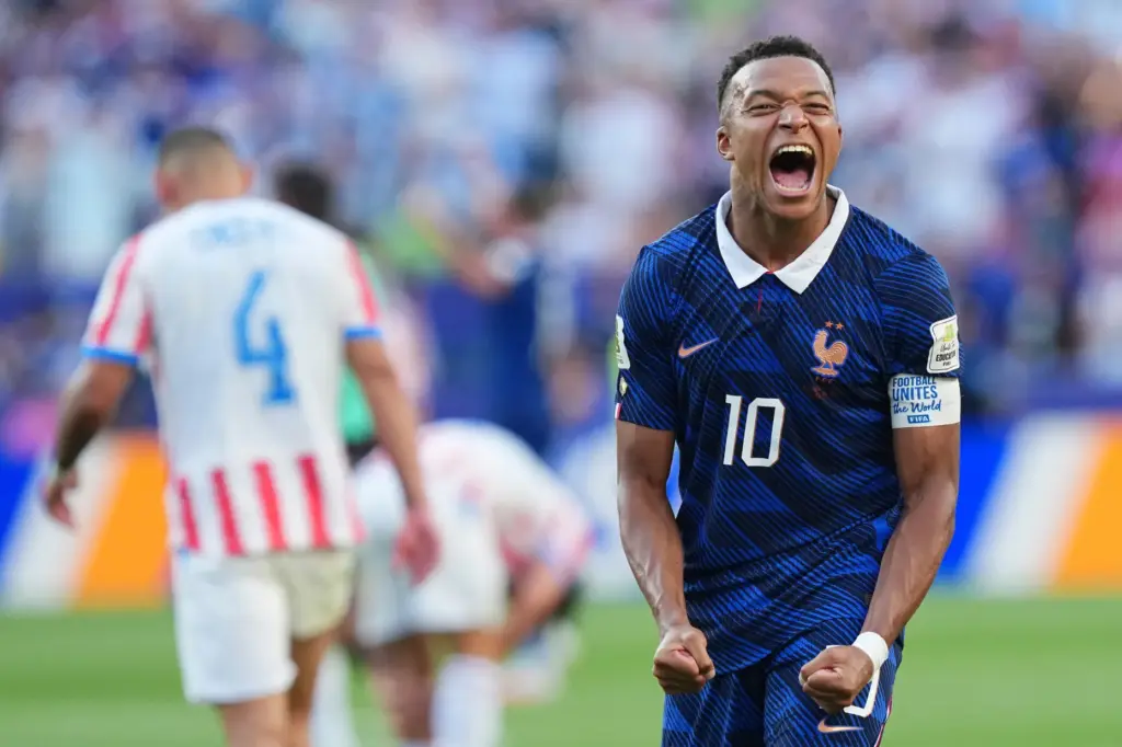 France’s Kylian Mbappe (10) celebrates his team victory at the...