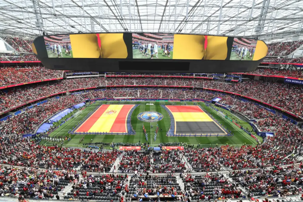 Spain and Belgium enter the field prior to the start...
