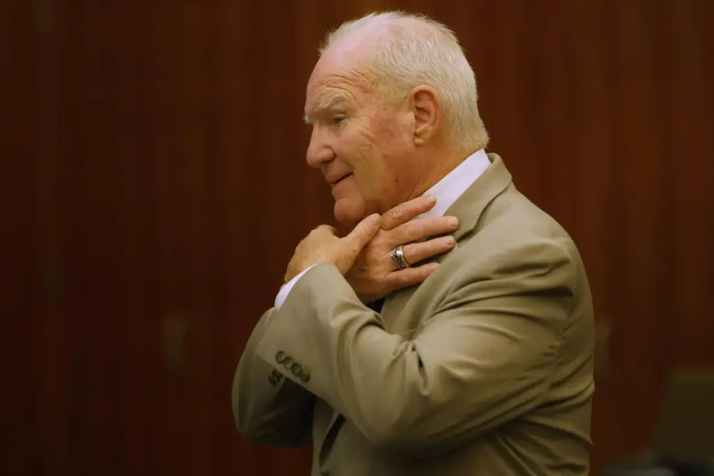 Kevin Reddington, a defense attorney, gestures as he cross-examines a witness.