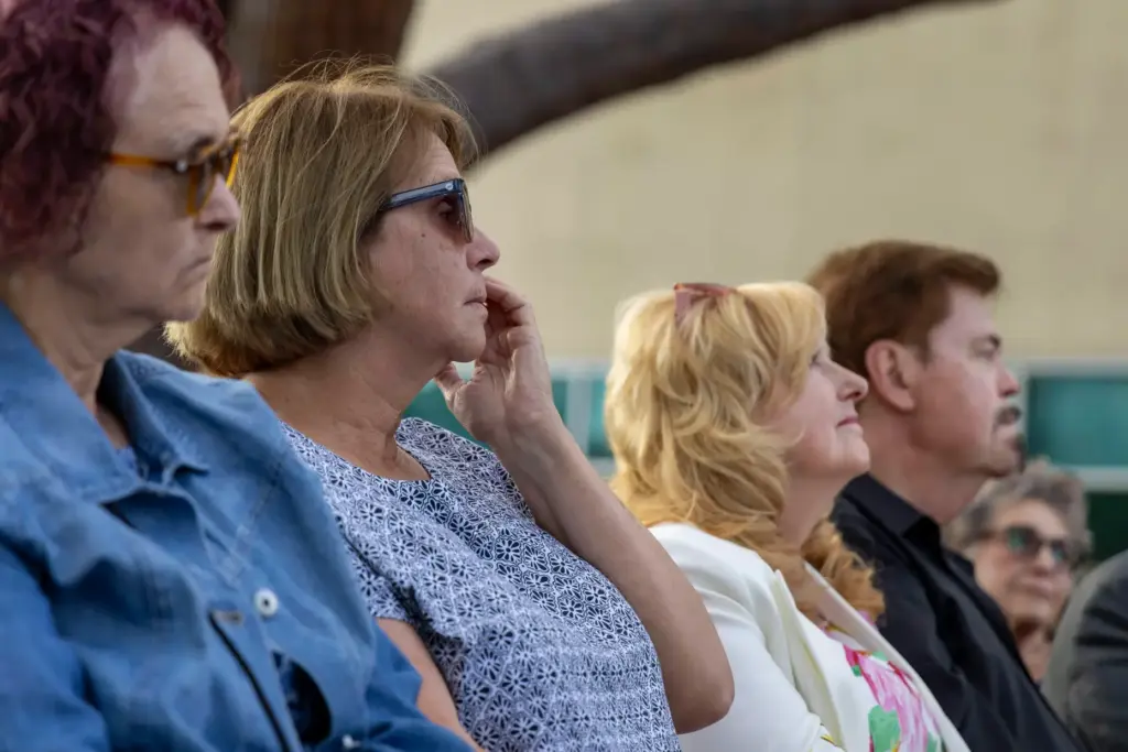 Linda Hackleman sheds a tear during a 50th anniversary candlelight...