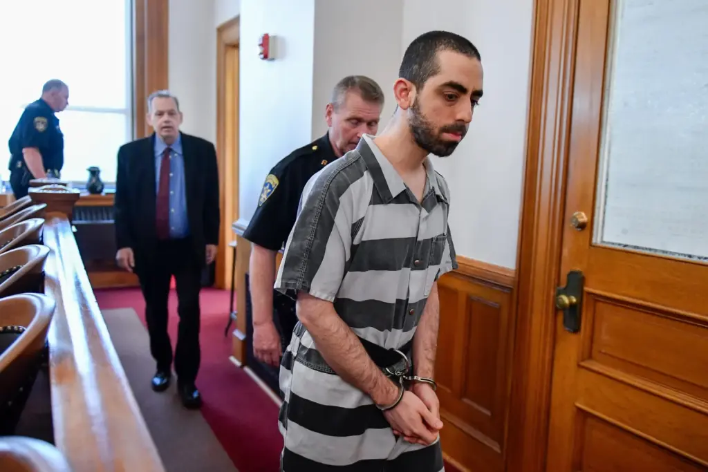 FILE – Hadi Matar walks in to the Chautauqua County...