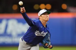 Dodgers hold off Mets for another road win