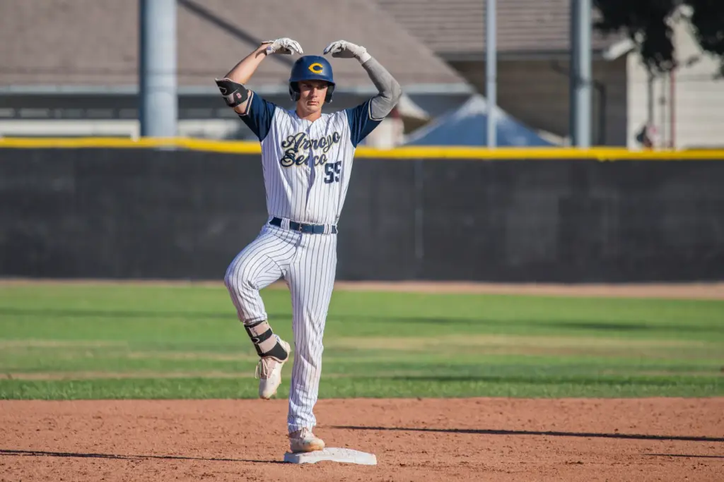 Arroyo Seco Saints first baseman and outfielder Paul Lizzul celebrates...