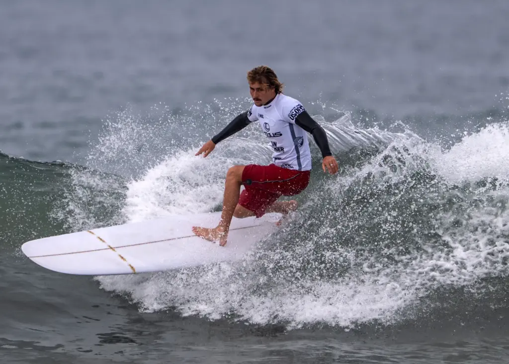 Tommy Coleman of San Clemente competes in the menâs longboard...