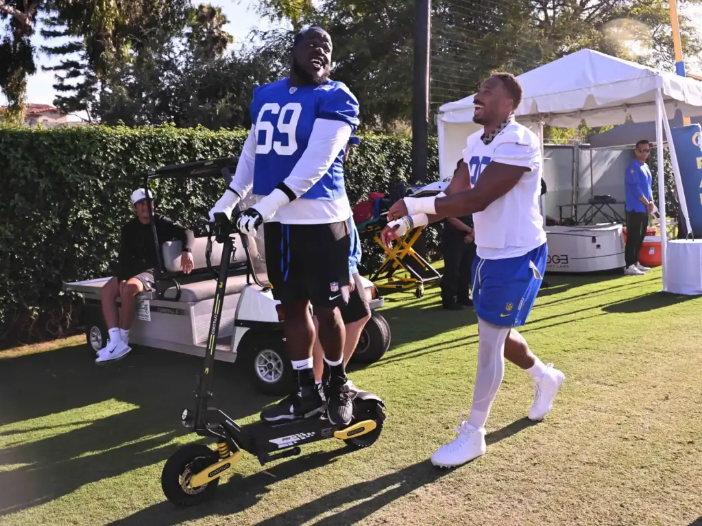 Rams defensive End Myles Garrett with guard Kevin Dotson during...