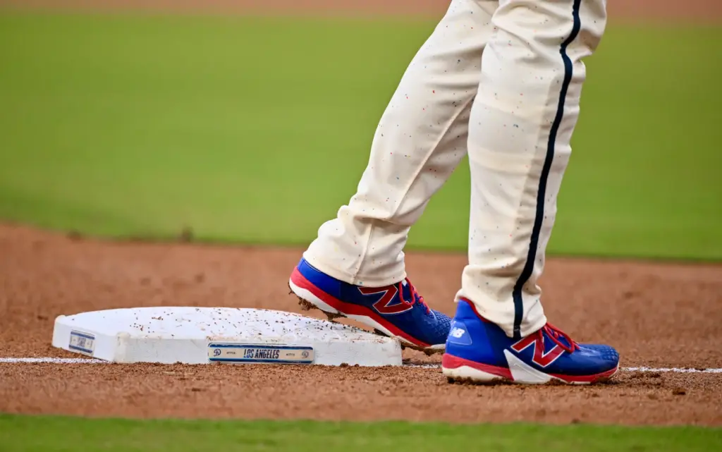 Shohei Ohtani of the Dodgers on third base against the...