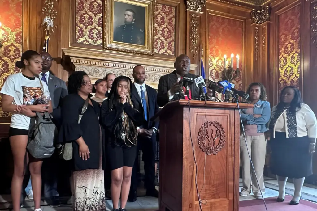 Attorney Ben Crump speaks alongside family members of Corey Ruiz,...