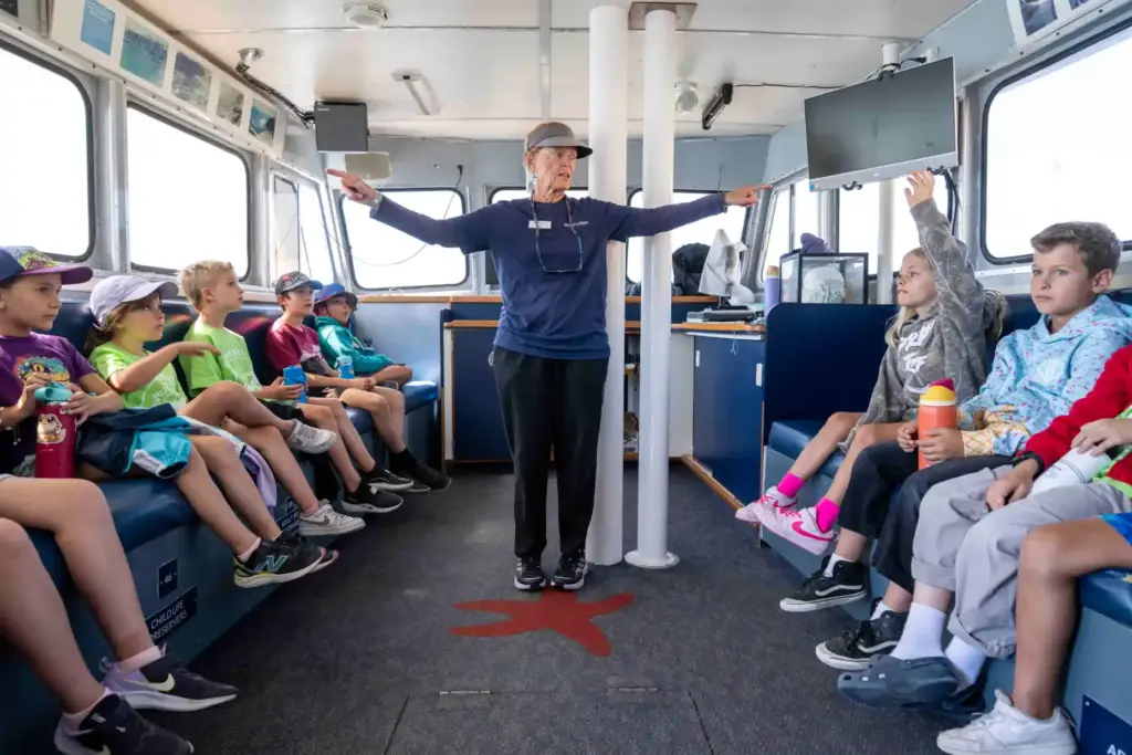 Dee Schroder, a deckhand on the Research Vessel Sea Explorer,...