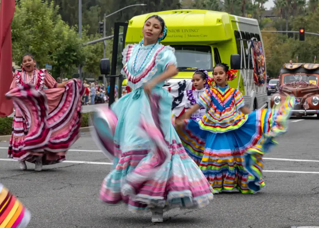A Ballet FolklÃ³rico group dances along Marguerite Parkway in Mission...