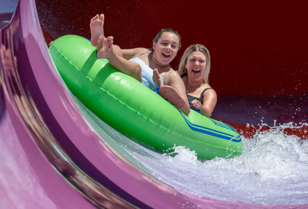 Ashley Canton of Chino rides Pelican Plunge with her daughter,...