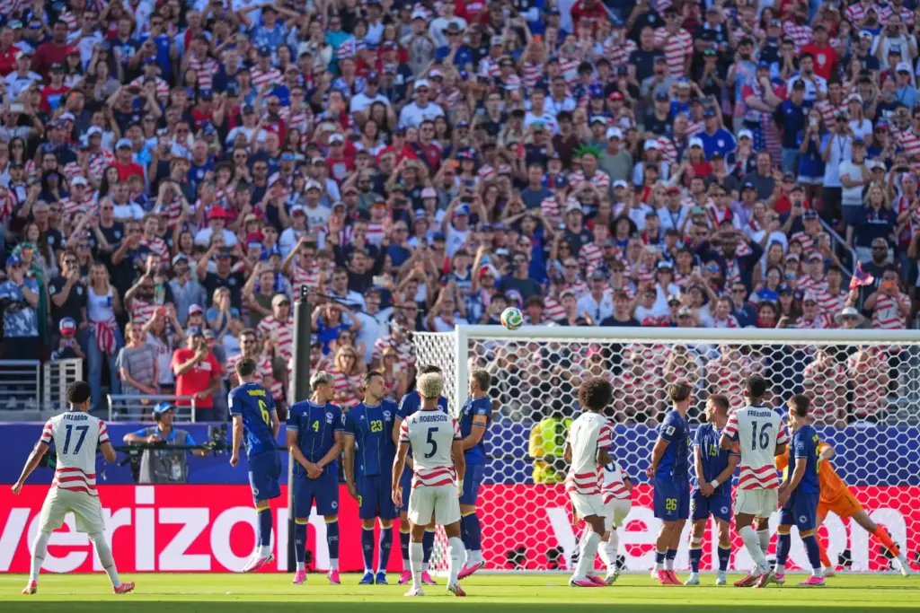 The United States’ Malik Tillman, left, scores his team’s second...