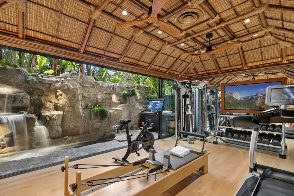 The wellness retreat includes a fitness studio with a rock...