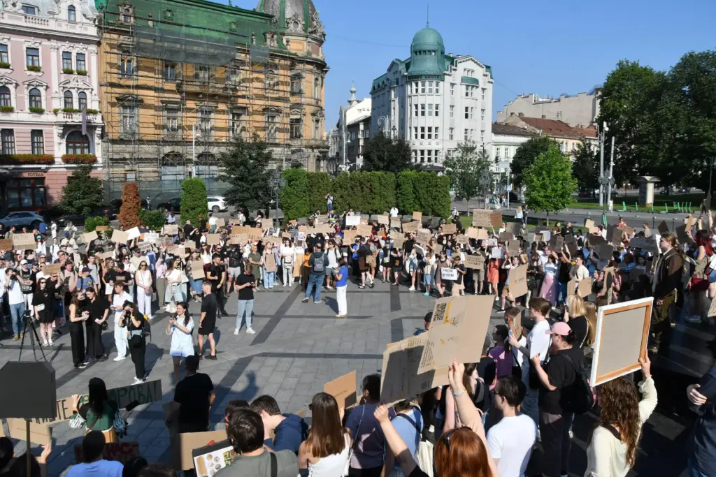 Ukrainians gather to denounce President Volodymyr Zelenskyy’s decision to dismiss...