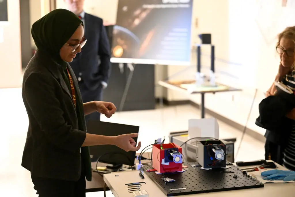 Aliza Hameed shows off her work on Optical Reef segmented...