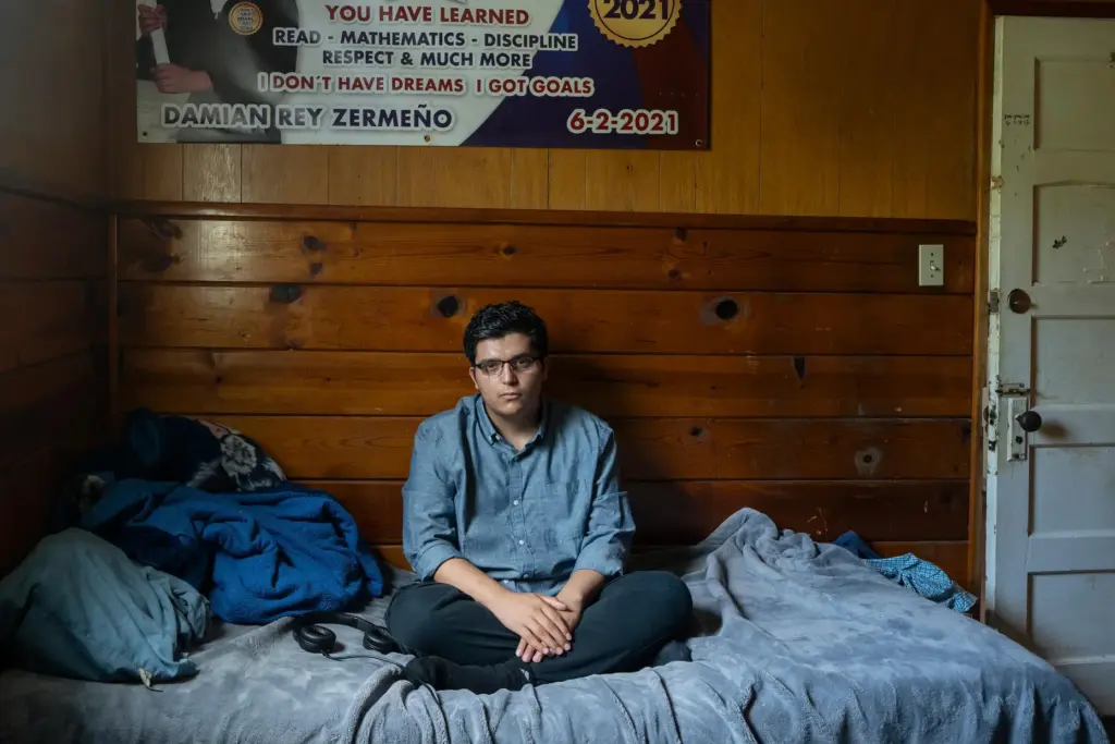 Damian ZermeÃ±o sits in the bedroom he used to share with his father.