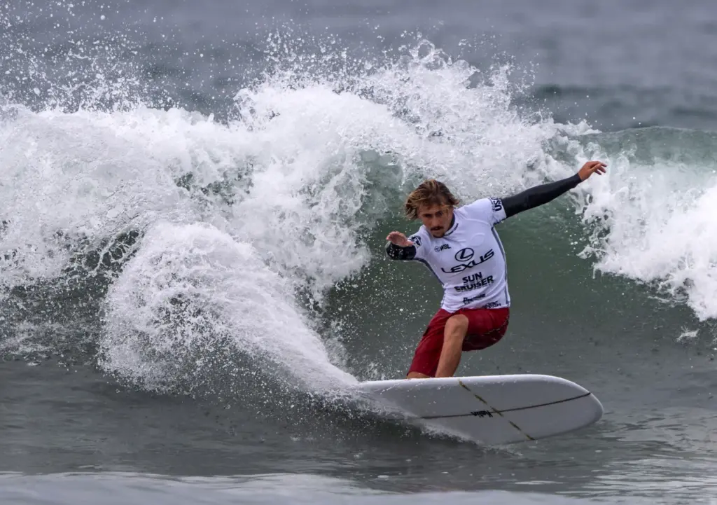 Tommy Coleman of San Clemente competes in the menâs longboard...