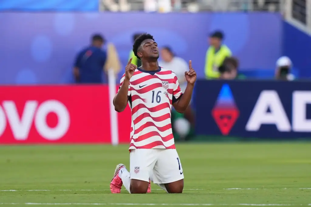 Alex Freeman (16) gestures on the pitch after United States defeated Bosnia.