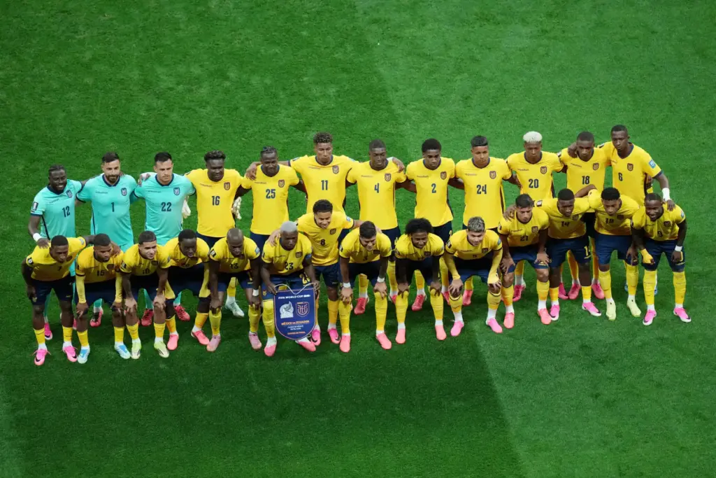 Ecuador players pose before the World Cup round of 32...