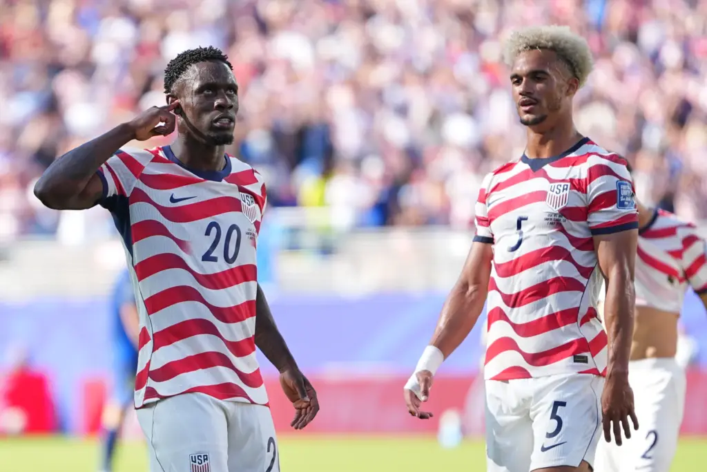 The United States’ Folarin Balogun (20) reacts after scoring his...