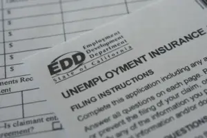 US filings for jobless benefits rise to 197,000 last week, but layoffs remain historically low