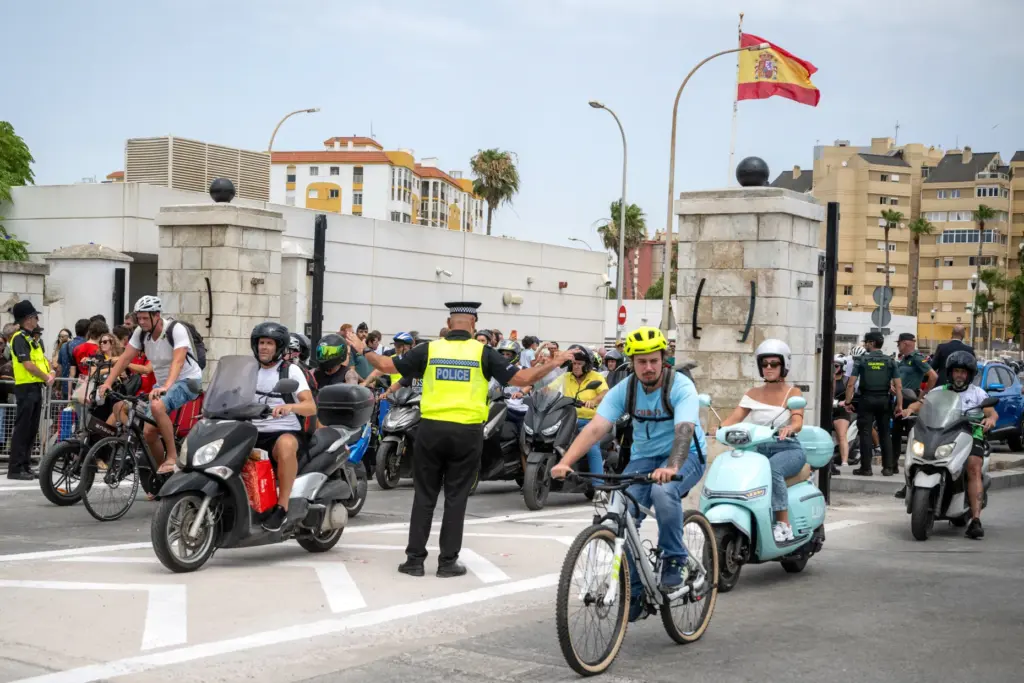 Motorists cross the Gibraltar-Spain border.