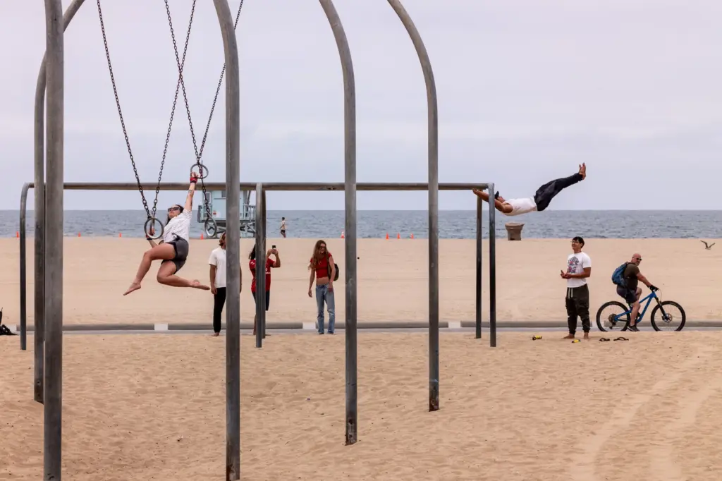 Beachgoers enjoy mild temperatures near the Santa Monica Pier on...