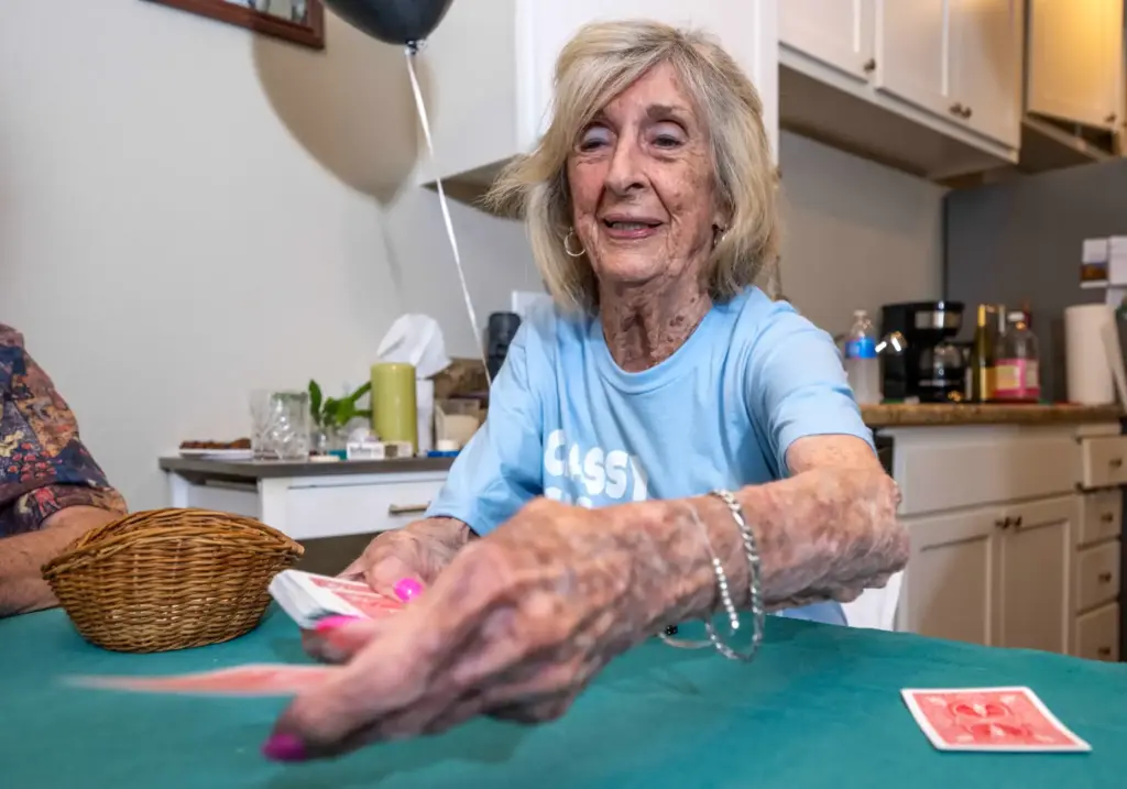 Dorothy Dahms, 97, who has been hosting a weekly poker...