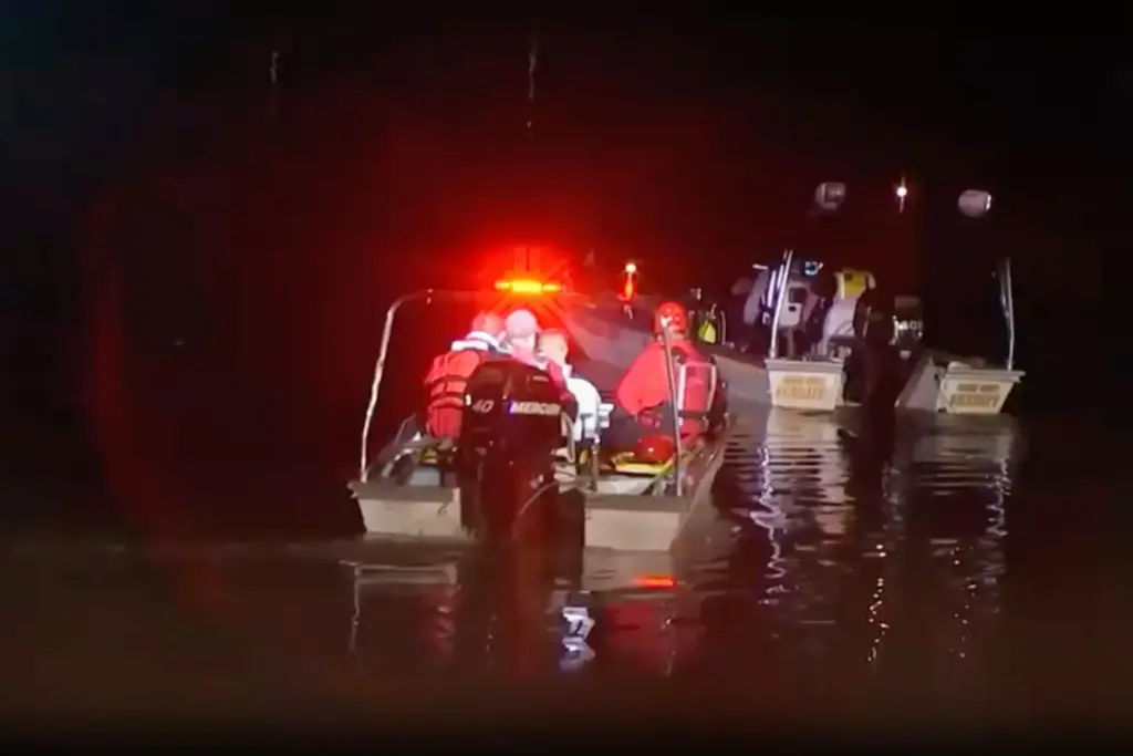 First responders search for missing children in the Passaic River.