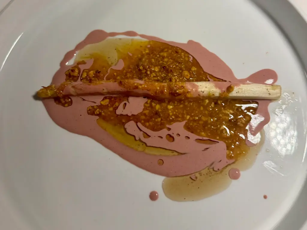 White asparagus with chicken liver sauce, coffee oil and hazelnut...