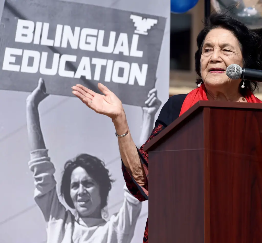 Dolores Huerta, 89, speaks to those gathered during the first...