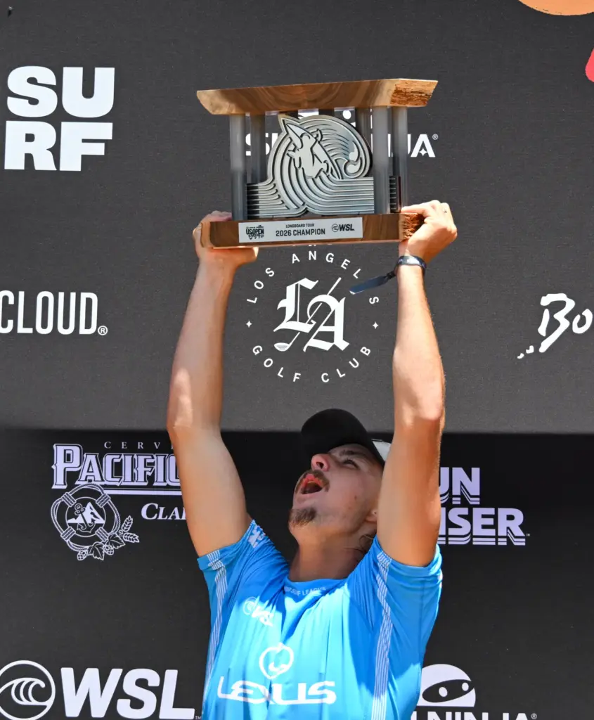 Tommy Coleman celebrates after winning the U.S. Open of Surfing...