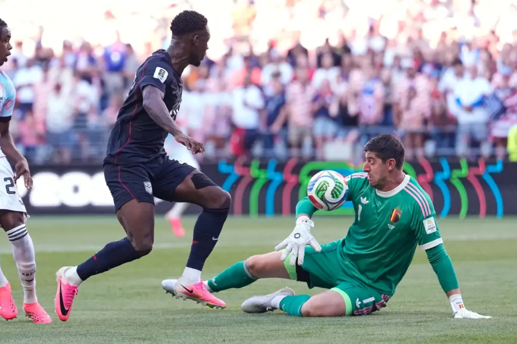 Belgium goalkeeper Thibaut Courtois (1) blocks a shot from United...