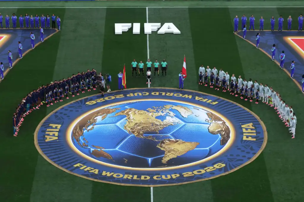 Spain and Austria players line up for the singing of...