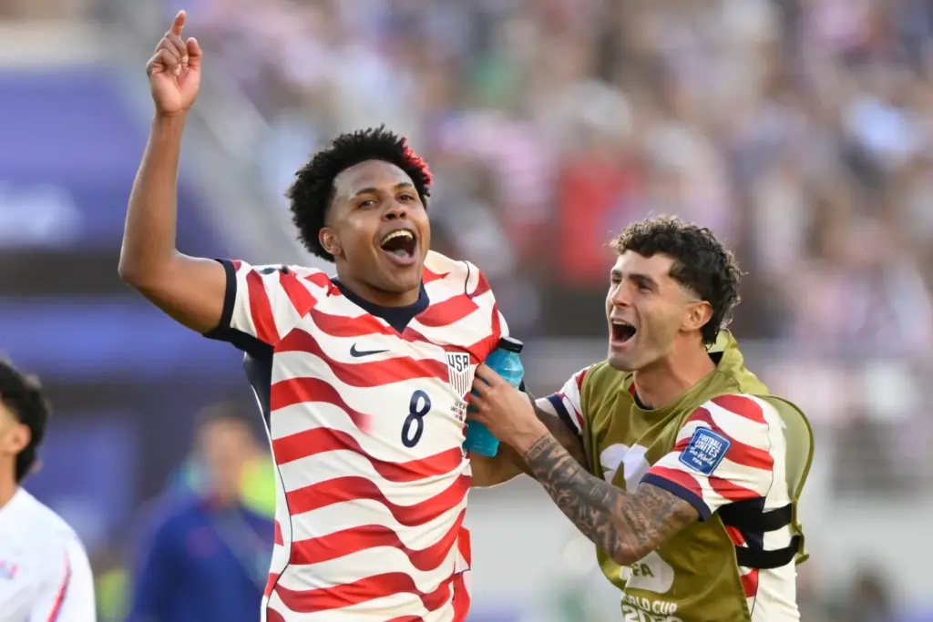 The United States’ Weston McKennie, left, and Christian Pulisic celebrate...