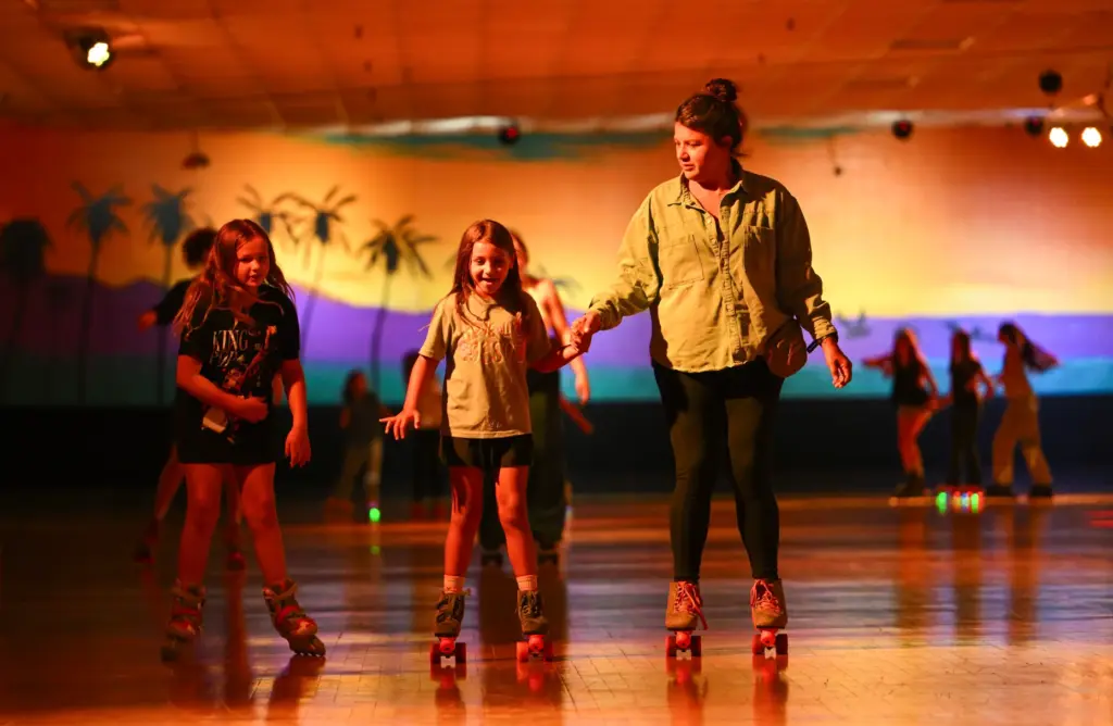 Briana Klistoff skates with her daughter, Ella Hanson, 7, at...