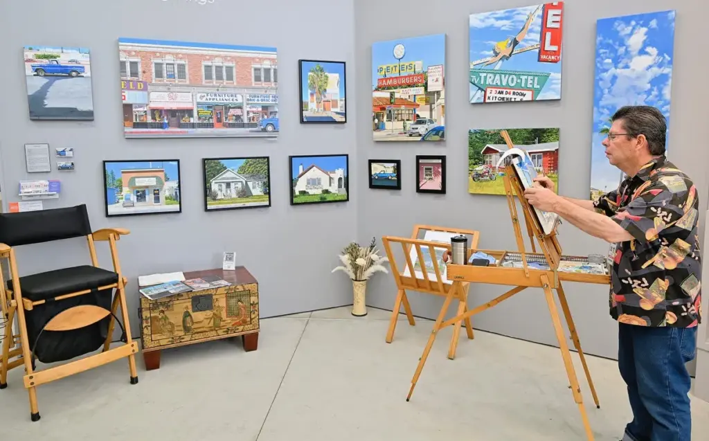 Michael Ward, who depicts disappearing Americana in his paintings, works...
