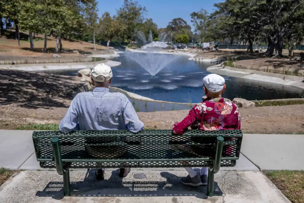 Costa Mesa residents Eric Locke, left, 91, and Ray Prettyman,...