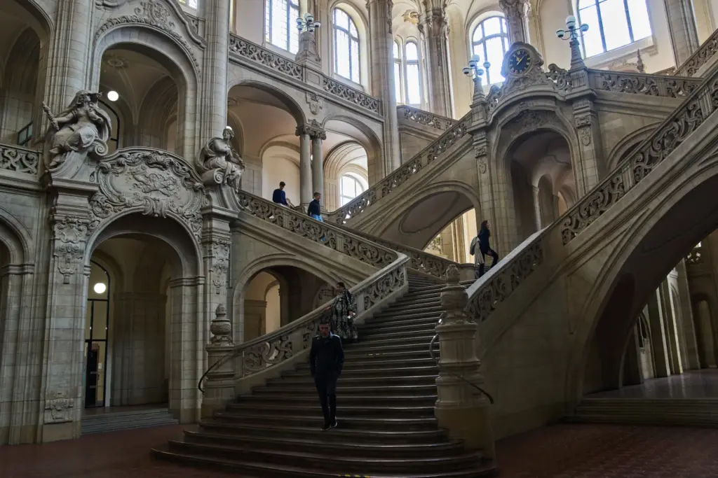 People walk in the court on the day of the trial against an online predator network.