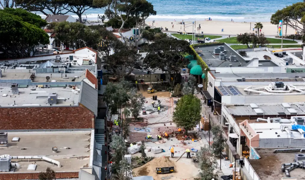 Work continues on the promenade along Forest Ave. in Laguna...
