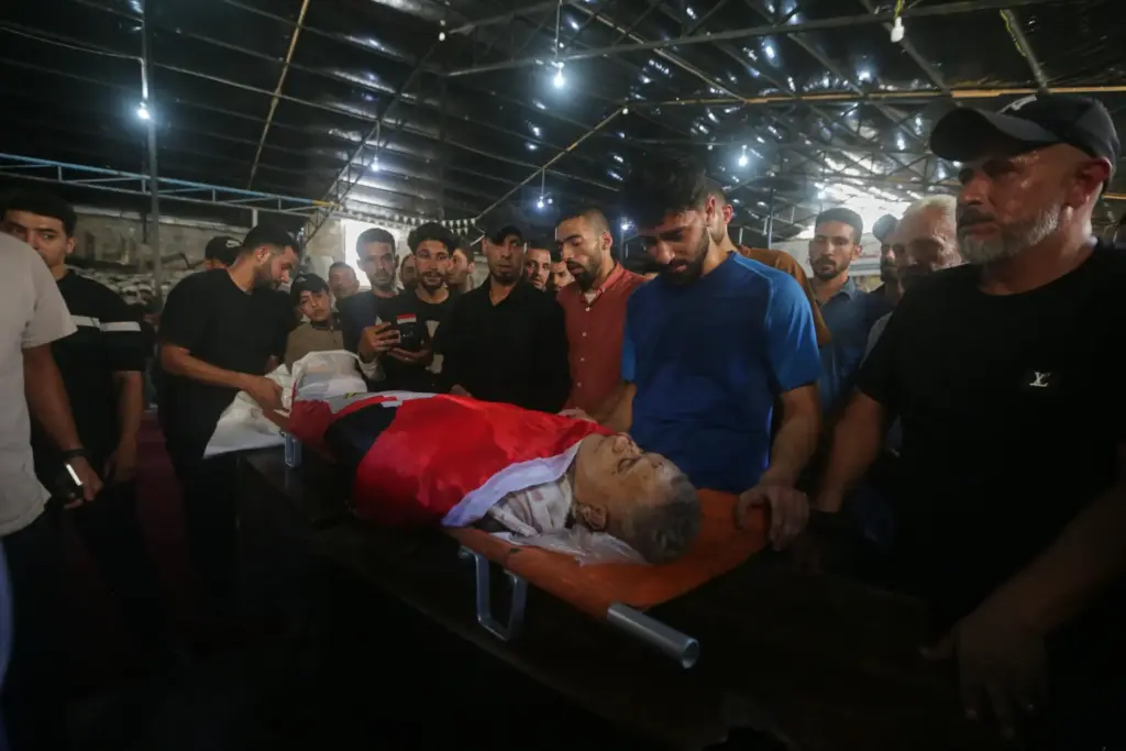 Palestinians mourn over the body of Mohamed al-Wahidi.