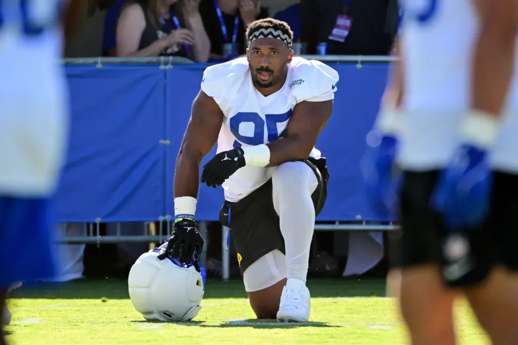 Rams defensive lineman Myles Garrett takes a breather during a...