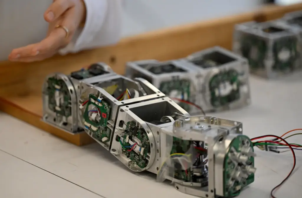 Undergraduates Emma Moreno and Isabella Pier demonstrate self-healing segmented robotic...