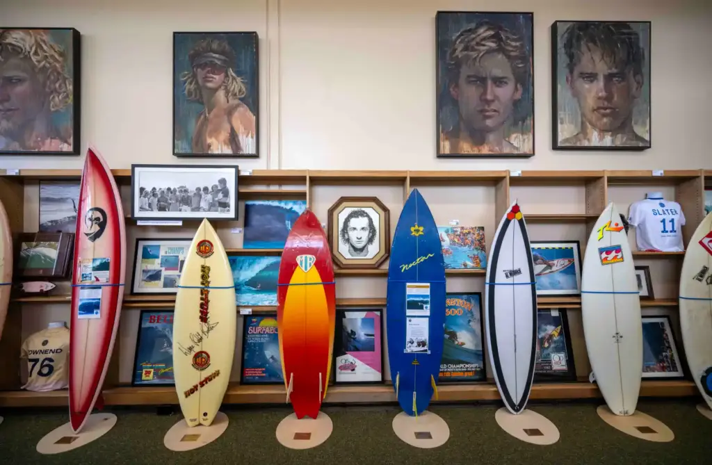 A display of surfboards ridden by some of the world...