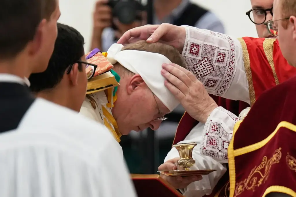 Father Pascal Schreiber is consecrated as bishop during a ceremony.