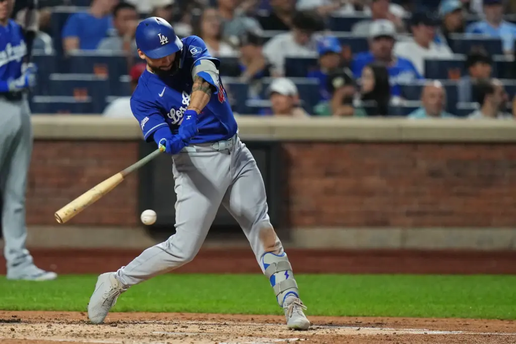 Dodgers’ Andy Pages hits an RBI single during the fifth...