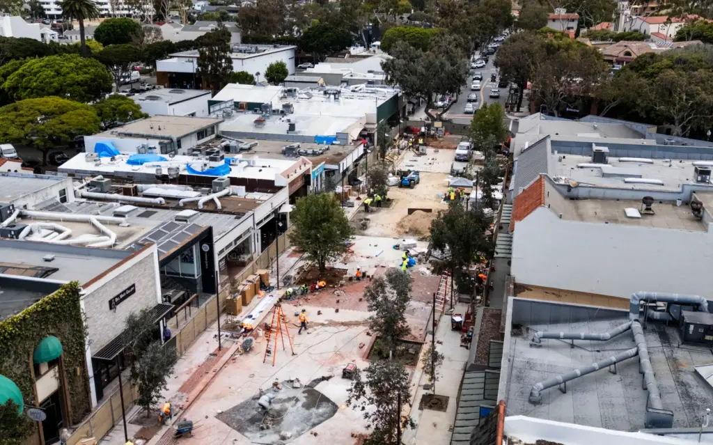 Work continues on the promenade along Forest Ave. in Laguna...